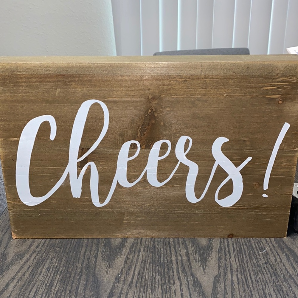 “Cheers” sign